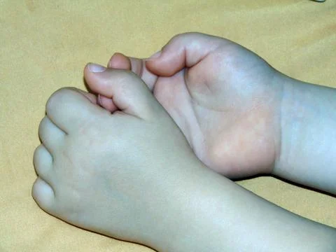 The hands of a little boy Stock Photos