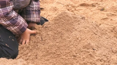 Hands of little boy playing with sand Stock Footage 71256180