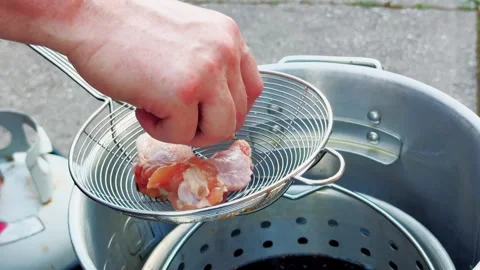 Hands Load Raw Chicken Wings Into Fryer Skimmer Stock Footage 346648800