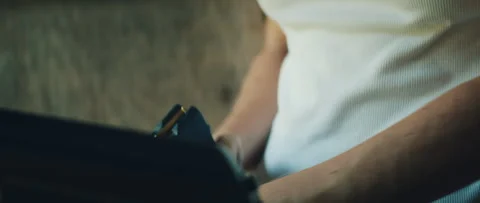 Hands loading bullets into magazine during preparation for shooting Stockbeeldmateriaal 313093199
