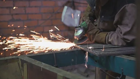 Hands of locksmith making steel partitions Stock Footage 80438871