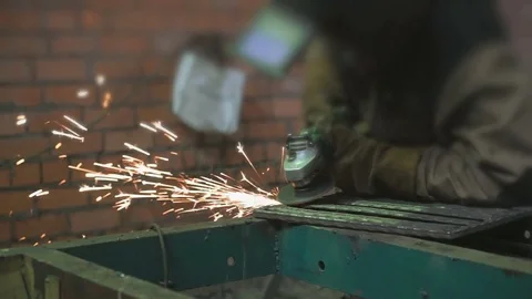 Hands of locksmith making steel partitions Stock Footage 84237522