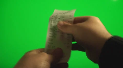 Hands Looking At A Receipt And Then Throwing It Away On A Green Screen, Chroma Stock Footage 37151044