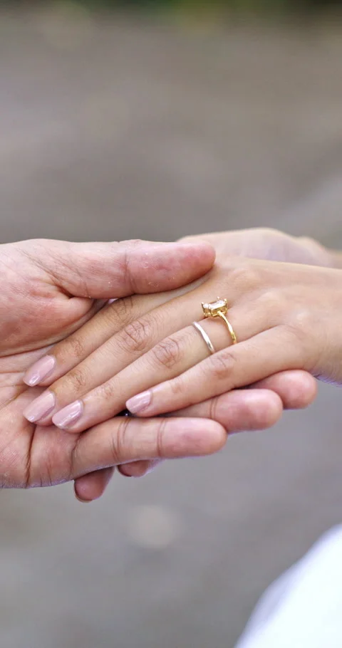 Hands, love and engagement ring with couple, wedding and bonding together with Stock Footage 336732503