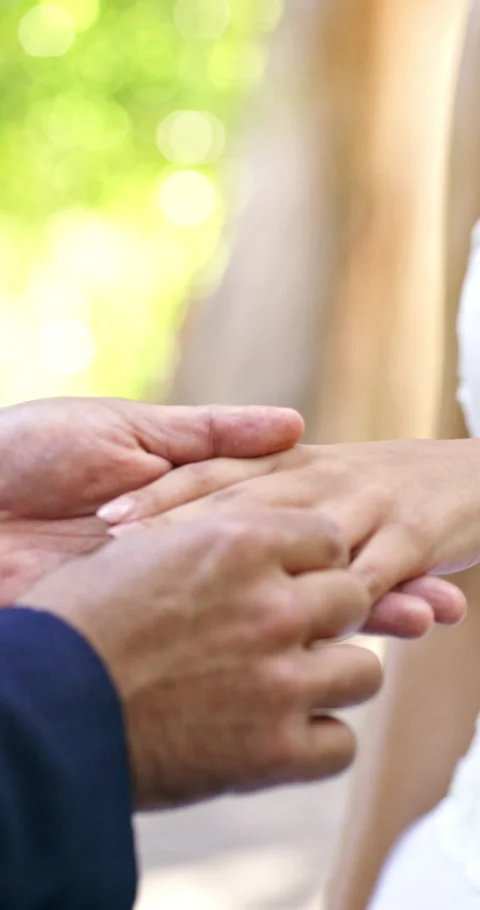 Hands, love and wedding ring with couple, marriage and bonding together with Stock Footage 336693068