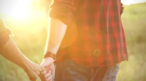 Hands of lovers in the sun Video stock 55300994