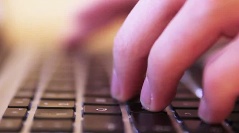 Hands on a Macbook on a wooden table Stock Footage 40358706