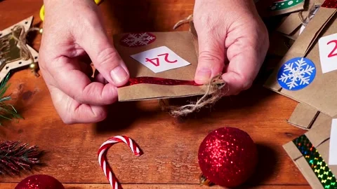 Hands make an Advent calendar. Stock Footage 164777216