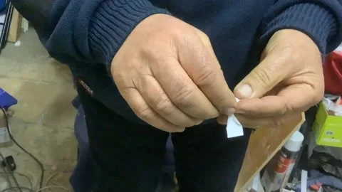 Hands make a flower paper Stock Footage 256214123