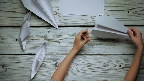 Hands make a paper boat Stock Footage 81775609