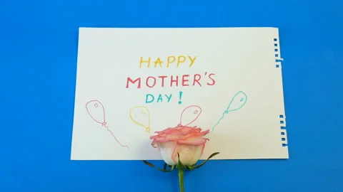 Hands make a roses frame around greeting card, happy mother's day concept Video stock 104721440