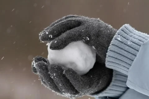 Hands make a snowball Stock Photos
