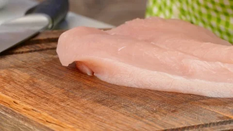 Hands makes a spinach filling inside the chicken fillet. Stock Footage 84355850