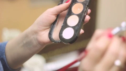 In the hands of the makeup artist shadows Video stock 73313471