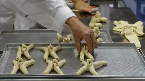 Hands making bread in baker factory horn shape 動画素材 95599164