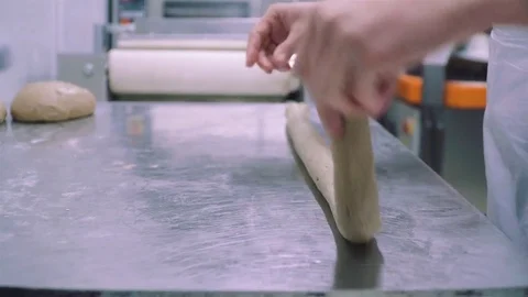 Hands making bun form for dough Stock Footage 73374661