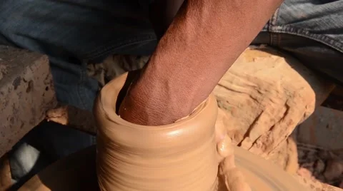 Hands of making clay pot on the pottery wheel ,select focus, close-up. Stock Footage 62206189