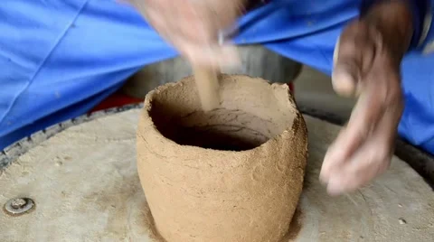 Hands of making clay pot on the pottery wheel ,select focus, close-up. Stock Footage 62208012