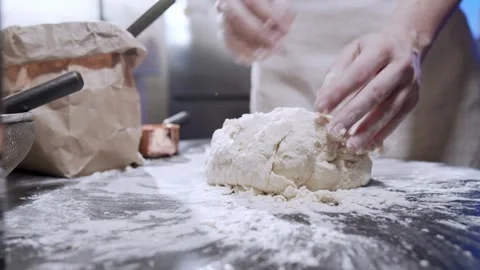 Hands making dough kneading flour in kitchen, closeup bakery food homemade .. Stock Footage 272466845