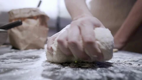 Hands making dough kneading flour in kitchen, closeup bakery food homemade .. Stock Footage 272466877