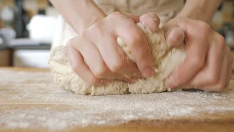 Hands making dough kneading flour in kitchen, closeup bakery food homemade .. Stock Footage 272466901