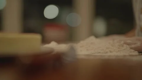 Hands making flour pile in background with knife foreground Vidéo 336374743