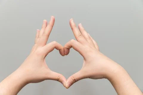 Hands making a heart shape Stock Photos