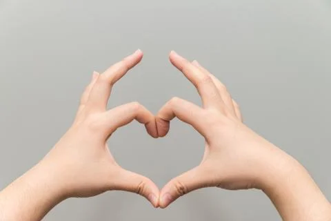 Hands making a heart shape Stock Photos