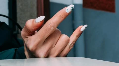 Hands making horns Stock Photos