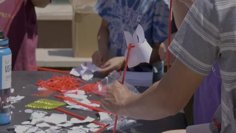 Hands making pinwheel Stock Footage 307960675