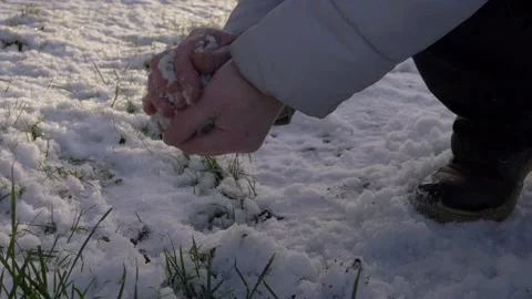 Hands making a snowball on winter day Stock Footage 149175287