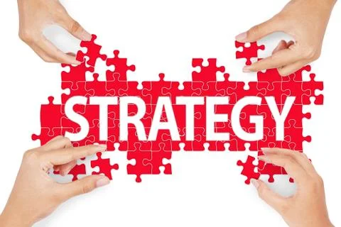 Hands making strategy from puzzle 스톡 사진
