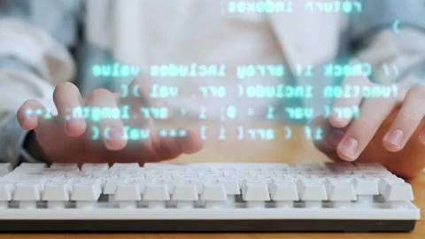 Hands of Male Person Typing Program Code on Computer Keyboard on Work Desk Stock Footage 232351525