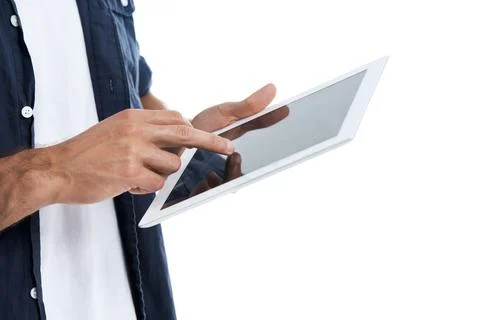 Hands, man and scroll on tablet in studio for editorial review, fact checking Stock-Fotos
