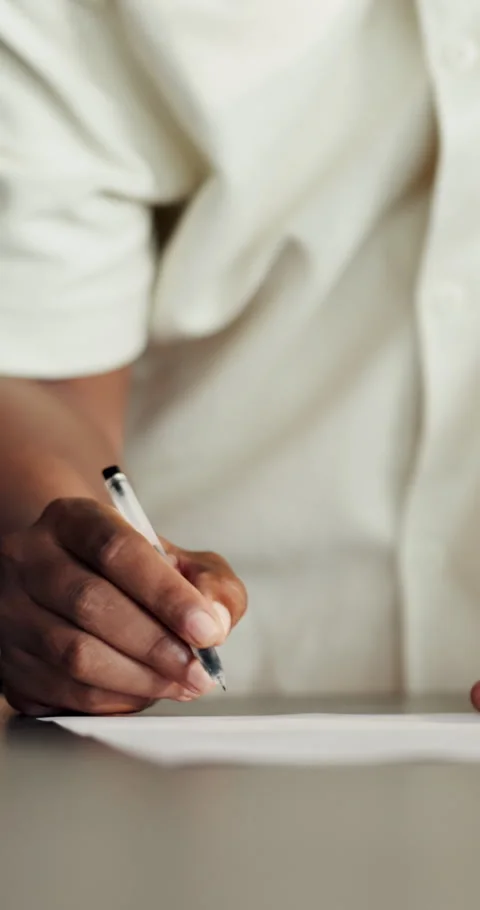 Hands, man and sign document in home for rental agreement, compliance and Stock Footage 336852813