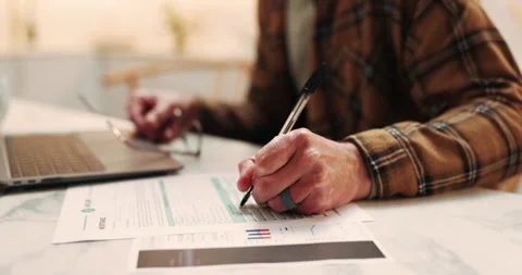 Hands, man and writing in home with document, application and information for Stock Footage 339158458
