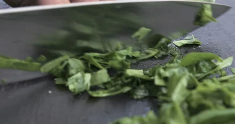 Hands of man chopping spinach Stock Footage 118761980