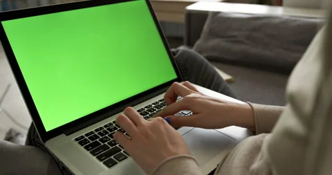 Hands of man at chroma key green screen laptop computer gesturing during an Stock Footage 145717811