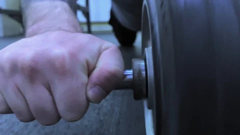 Hands of man clapping magnesia in slow motion.  Preparing to lift barbell Stock Footage 117937810