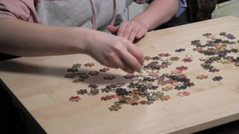 The hands of the man collecting puzzles . Stock Footage 231912065