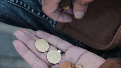 Hands of a man counting coins close up view. Stock Footage 145654362