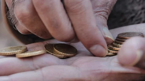 Hands of a man counting coins close up view. Stock Footage 145654366