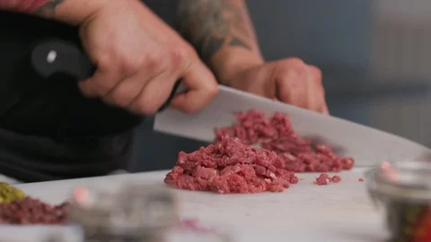Hands man cutting fresh meat raw lunch condiment preparation beef board cooking Stock Footage 103289115