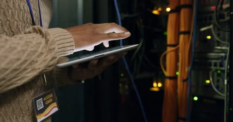 Hands of man in data center with tablet, network administration and engineer in Vídeos de archivo 243019944