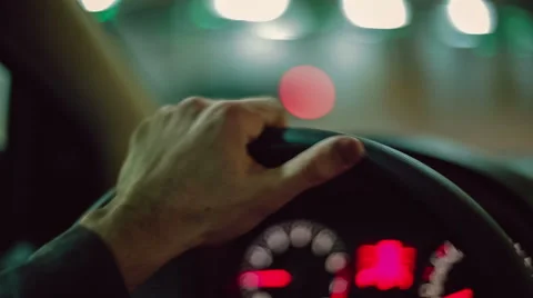 Hands of a man driving a car. Close up Stock Footage