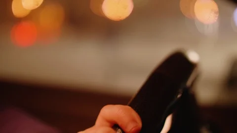 Hands of man driving car. Close up of male hands on steering wheel. Blur of 스톡 동영상 102548055