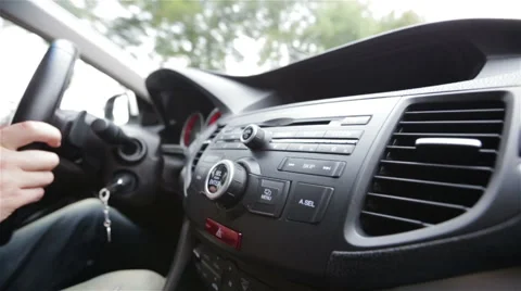 Hands of a man driving a car in slow motion Stock Footage 65831239
