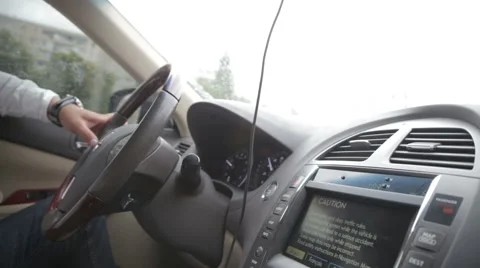 Hands of a man driving a car in slow motion Stock Footage 66332853