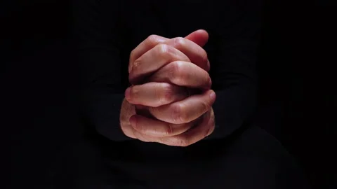 Hands of man in the foreground. Prayer, concept of meditation. Stock Footage 224929167