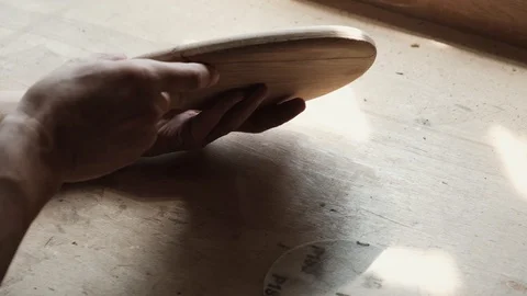 The hands of man grinding a cutting Board. Close up. Stock Footage 123941483